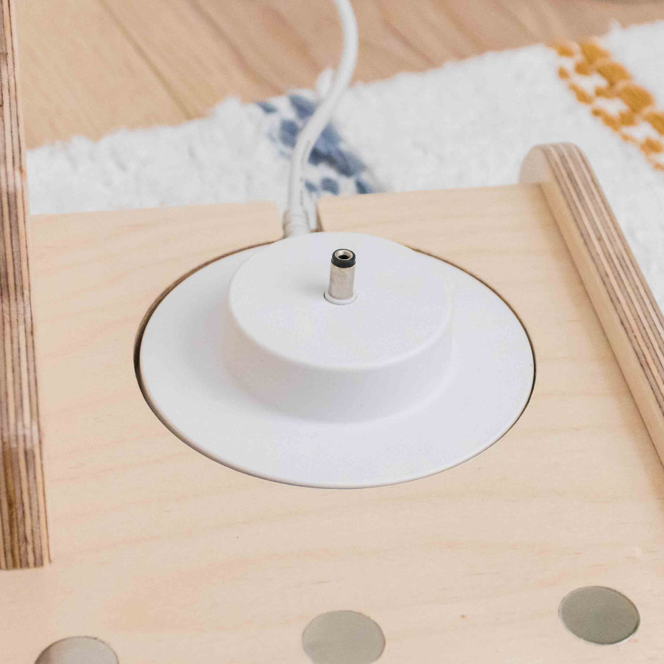 Close up of a tonie box display showing its built in charging port design specifically for tonie box chargers.