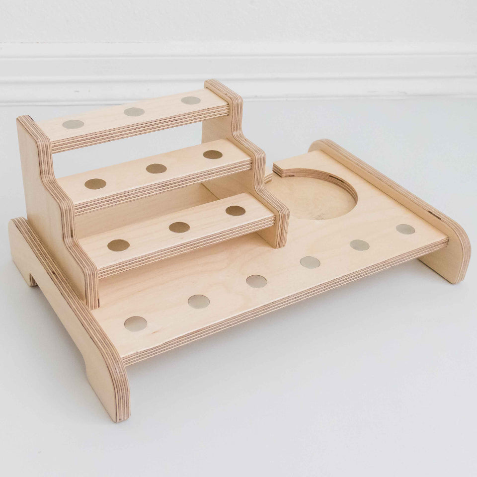 Side view of a tonie regal showing its natural build and magnetic design.