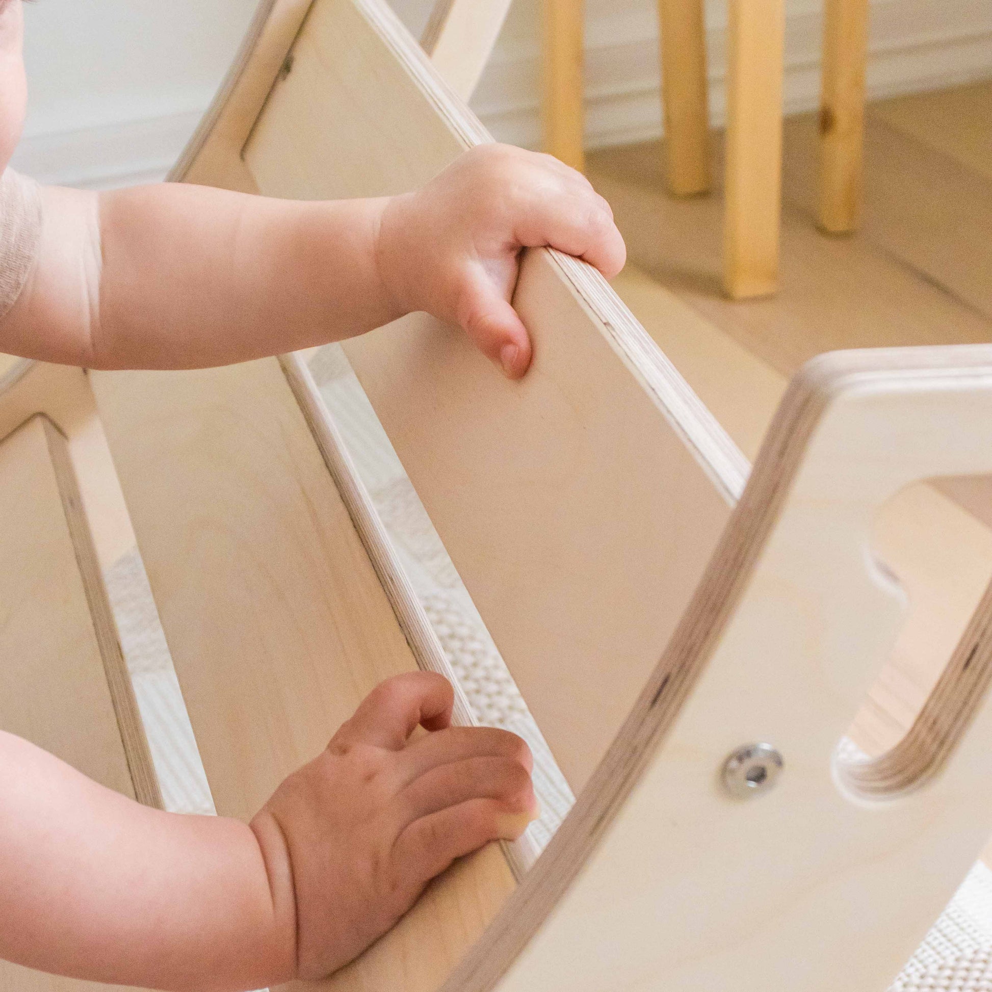 Close up of a children's climbing arch showing the safe spacing for toddlers. 
