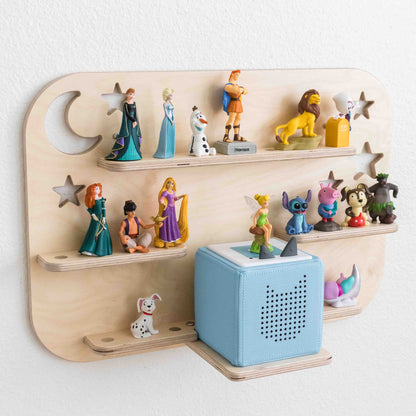 A wooden shelf designed to hold a toniebox and tonie figures